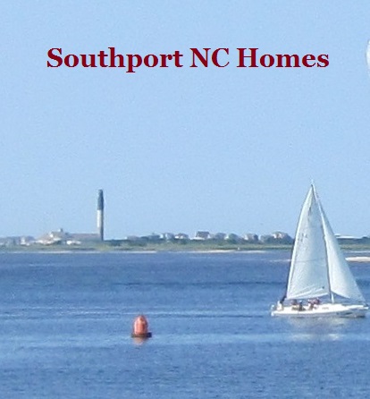 sailboat and the Cape Fear River at Southport NC